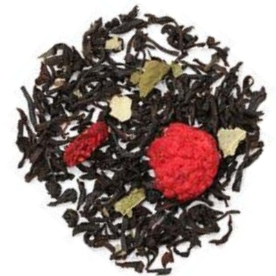 Black tea leaves with red berries and gold leaves on a white background